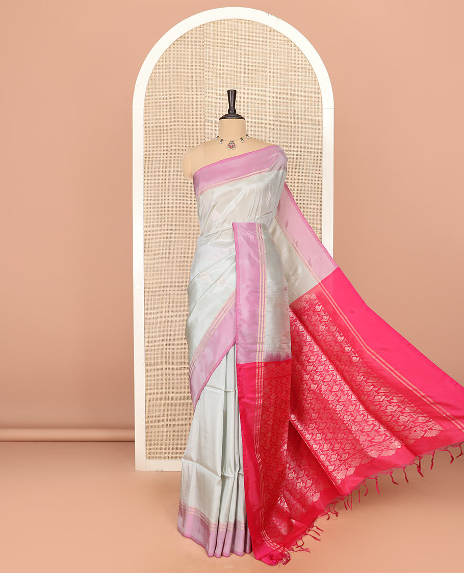 Grey Semi Uppada Saree Embellished with Zari Buttas, Complemented by a Contrast Bavanji Border, Pallu Elevated with Intricate Zari Designs, and Paired with a Contrast Blouse