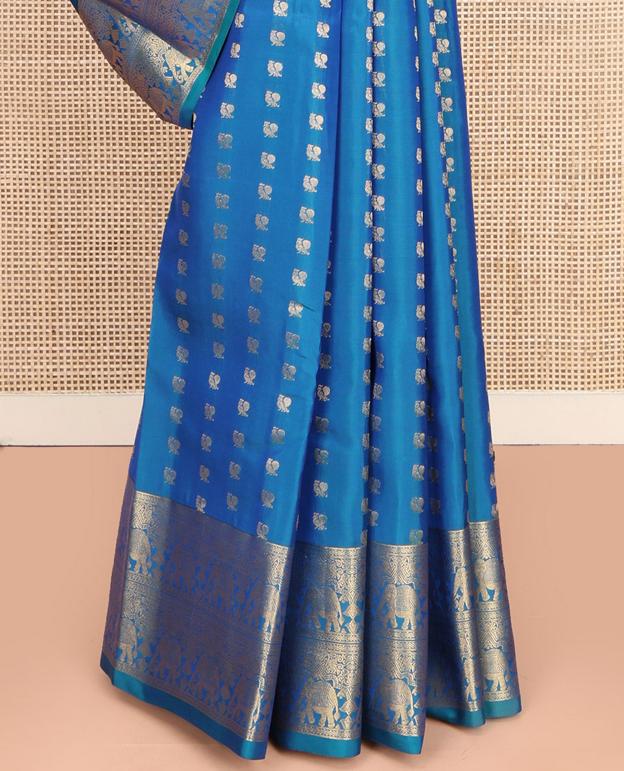 Blue Vasundhara Lite-Silk Mix Saree, Artfully Woven with Mayil Buttas, Highlighted by Zari Border of Rettai Neli, and Yaanai Designs, Grand Ogee Patterned Pallu, and Paired with a Matching Blouse