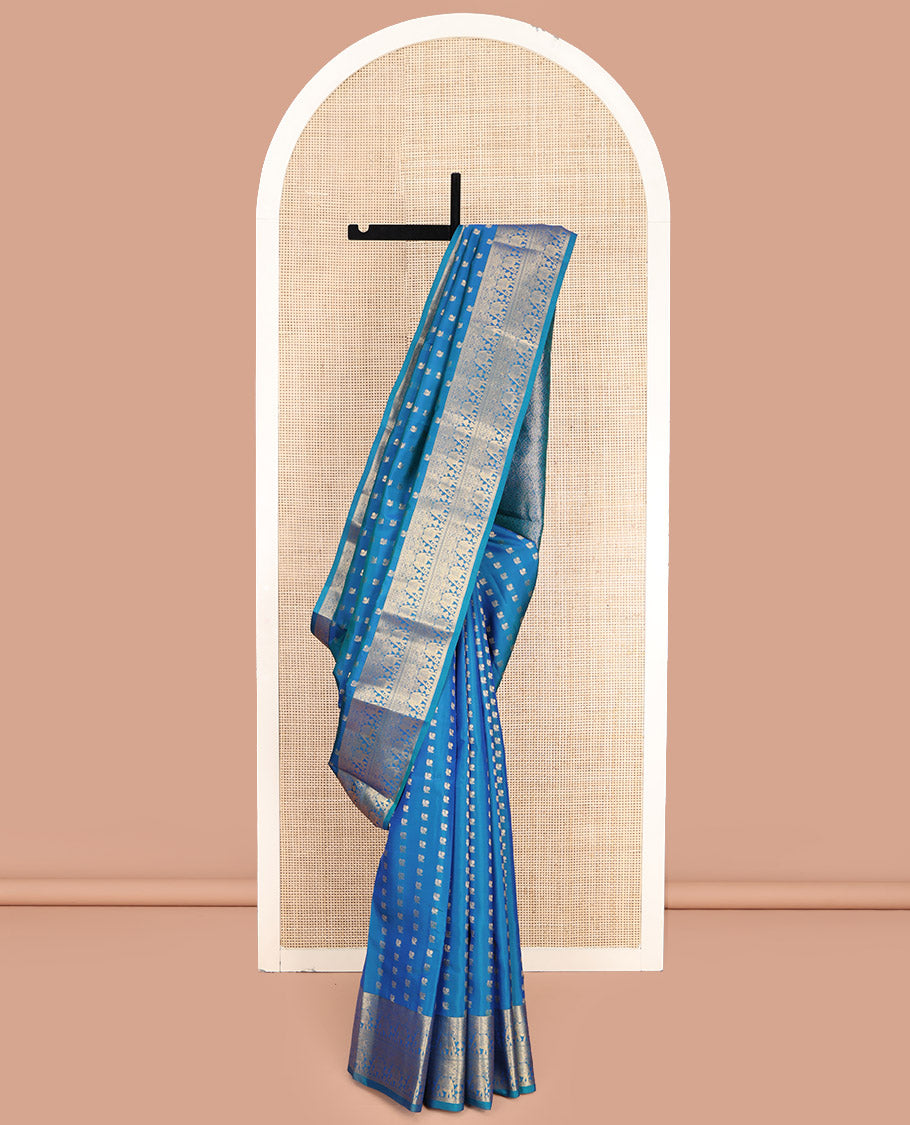 Blue Vasundhara Lite-Silk Mix Saree, Artfully Woven with Mayil Buttas, Highlighted by Zari Border of Rettai Neli, and Yaanai Designs, Grand Ogee Patterned Pallu, and Paired with a Matching Blouse