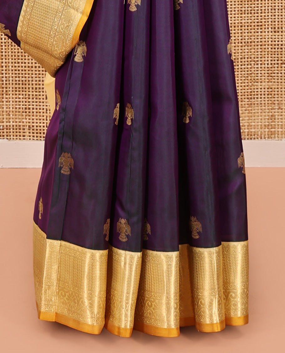 Purple Vasundhara Silk Saree, Elevated with Iruthakshi Buttas All Over Its Body, Complemented by a Contrast Border of Rekku, Then Kuli Kann, and Kodi Visiry Designs, Grand Jaal Pallu, and Paired with a Contrast Blouse