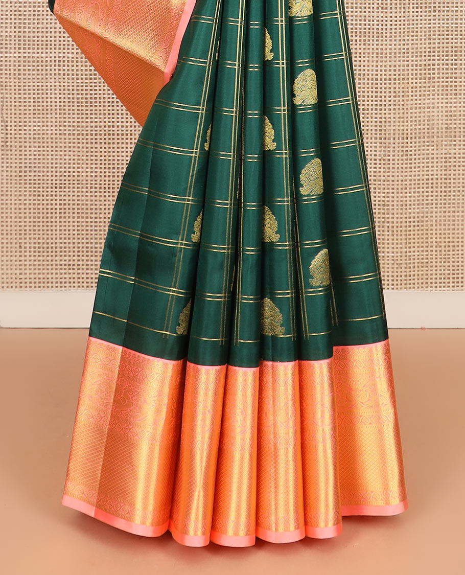 Green butta enclosed zari checked silk saree, contrast temple border of thilakam mokku, muthu, kodi visiry, mayil, and mayil kann designs, and geometric patterned pallu