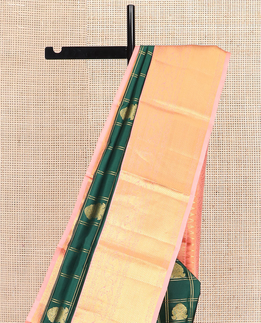 Green butta enclosed zari checked silk saree, contrast temple border of thilakam mokku, muthu, kodi visiry, mayil, and mayil kann designs, and geometric patterned pallu
