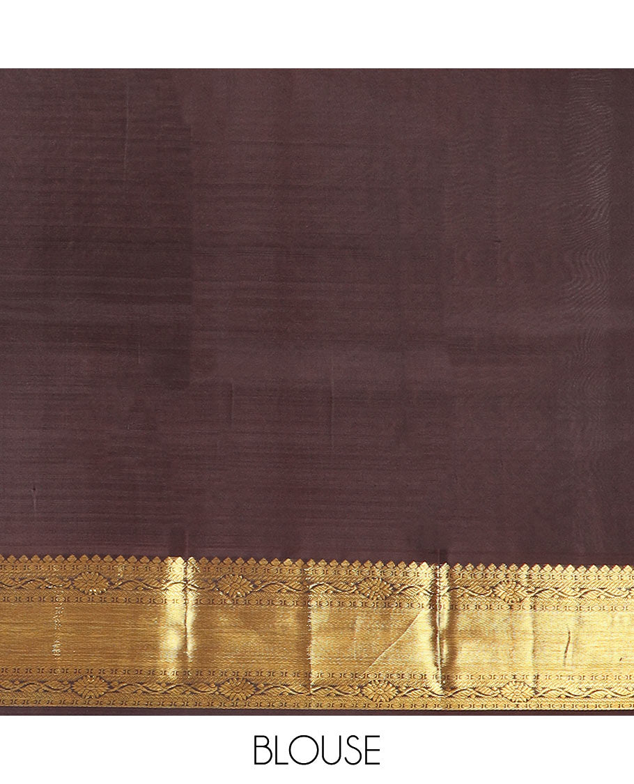 Purple Vasundhara Silk Saree Beautified with Yaanai and Poun Buttas, Complemented by a Contrast Border of Neli, Mayil Kann, Muthu, Banaras, and Yaanai Designs, Pallu Woven in Jaal Design, and Paired with a Contrast Blouse