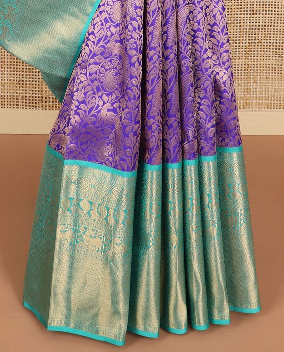 Purple jaal design kancheepuram silk saree with contrast border of rekku, muthu, poo chakram mayil design & zari design pallu
