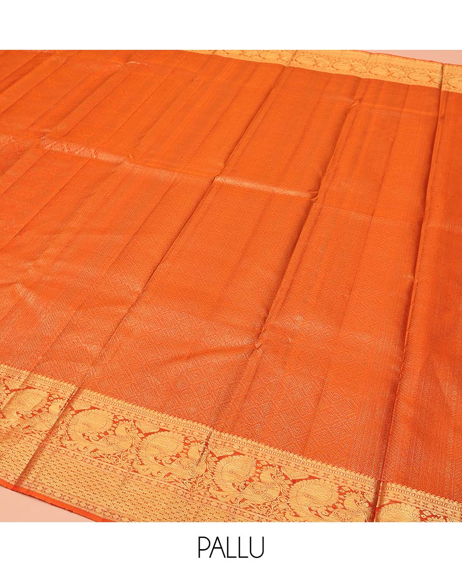 Rust Kanchipuram Wedding Silk Saree, Sparsely Woven with Jacquard Design On Its Body, Highlighted by Zari Border of Manga Mokku and Mayil Designs, Grand Jaal Pallu and Paired with a Matching Blouse