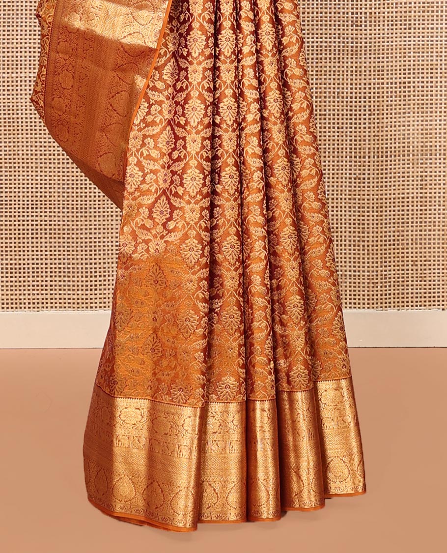 Orange Kanchipuram Wedding Silk Saree, Finely Crafted with Jacquard Designs on Its Body, Highlighted by a Zari Border of Thilakam, Kodi Visiry, Mayil, Yaanai, Jaal, and Lavangam Designs, Grand Ogee Patterned Pallu, and Paired with a Matching Blouse