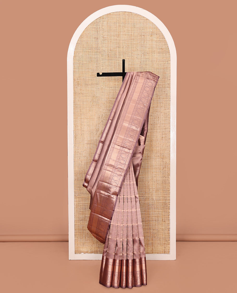 Rosewood Pink Kanchipuram Wedding Silk Saree, Embellished with Jacquard Design on Its Body, Highlighted by Zari Border of Rekku, Muthu, Rudraksham, Mayil Kann, and Kodi Visiry Designs, Grandly Decked up Pallu, and Paired with a Matching Blouse