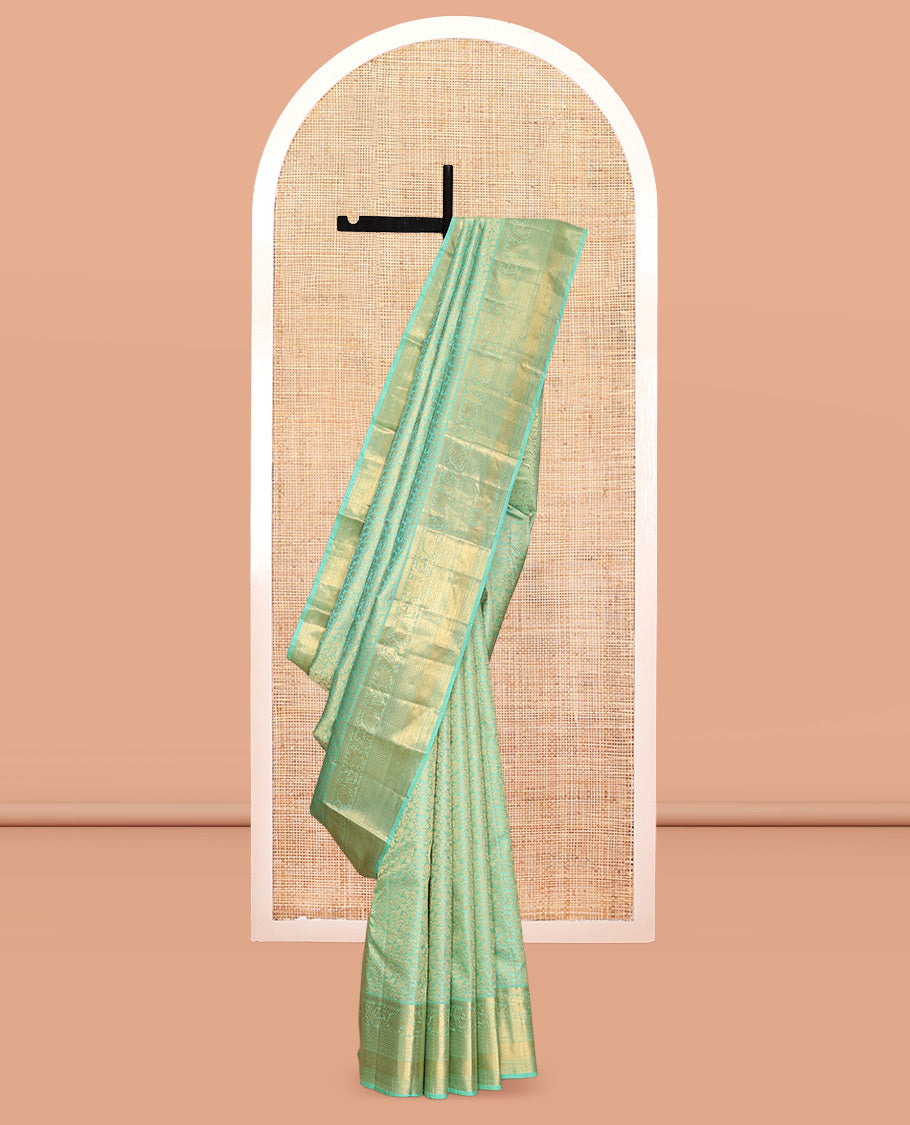 Turquoise Kanchipuram Wedding Silk Saree, Decorated with Jacquard Design, a Traditional Zari Border, Grand Pallu, and a Matching Blouse