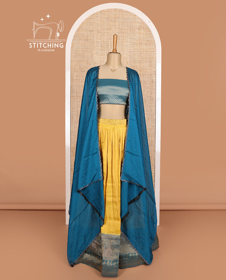 Yellow art silk half-saree, brocade with contrast traditional border skirt, contrast brocade blouse, scallop stone work dhavani, and and detachable belt