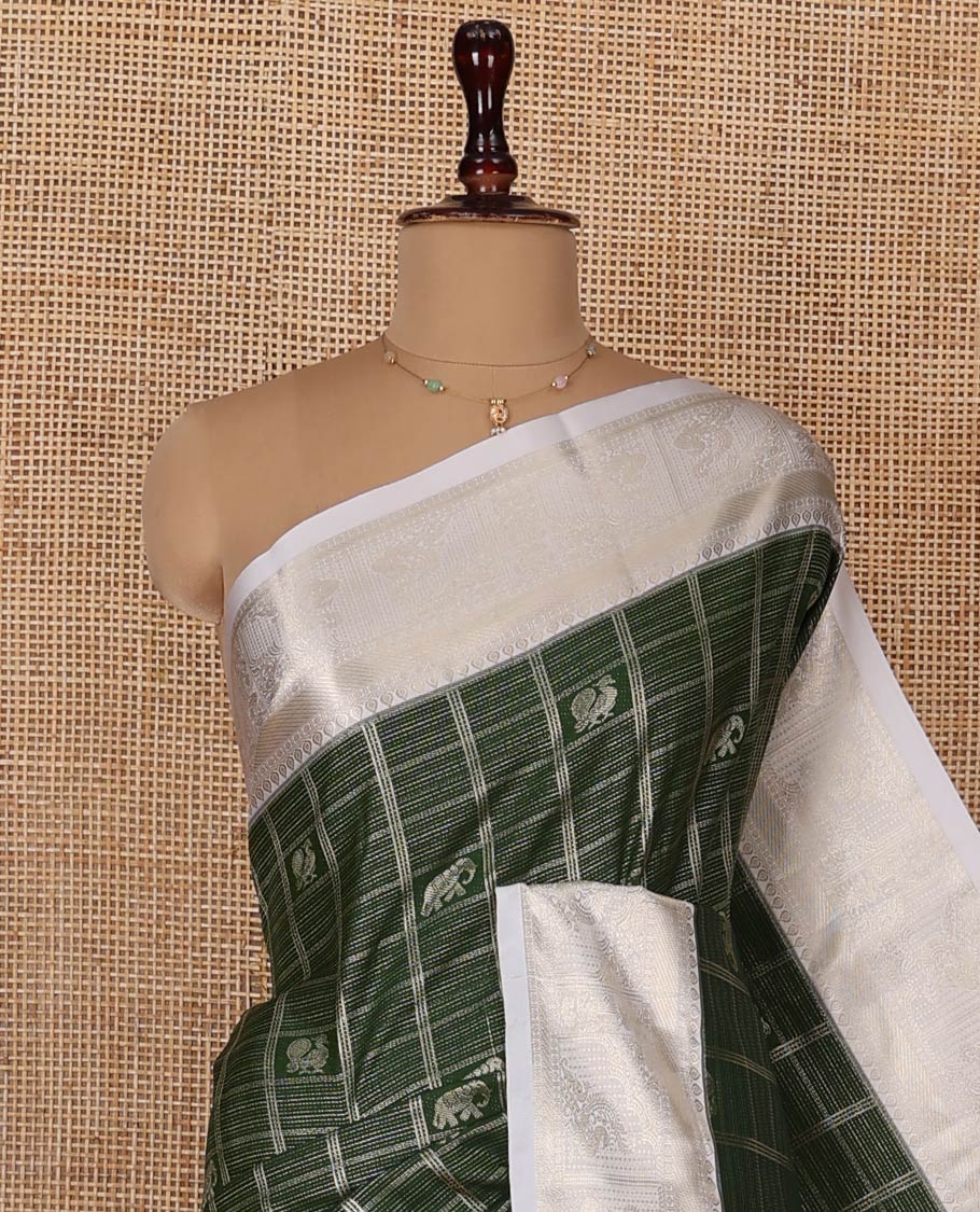 Green Budget Silk Saree, Mesmerized with Peacock and Elephant Motif Enclosed Checks, Complemented by a Contrast Traditional Zari Designs Woven Border, Pallu of Jaal Designs, and Paired with a Contrast Blouse