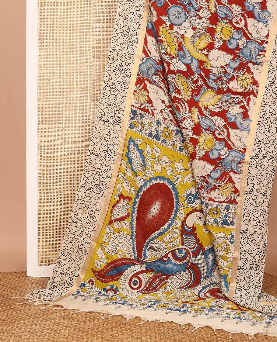 Maroon flora-fauna machine-printed Kalamkari cotton saree, contrast floral printed border, and pallu of big peacock print
