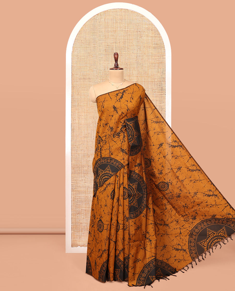 Borderless Yellow-Black Poly Cotton Saree, Decked Up with Batik Print, a Self-Printed Pallu, and a Matching Blouse