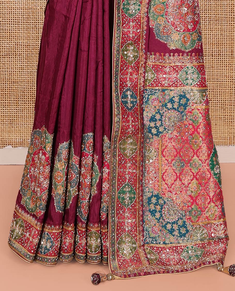 Wine Dola Silk Saree, Embellished with Rangoli-Style Colorful Embroidery on Its Body, Highlighted by an Embroidered Border, Pallu of Embroidery and Print Work, and Paired with a Matching Blouse