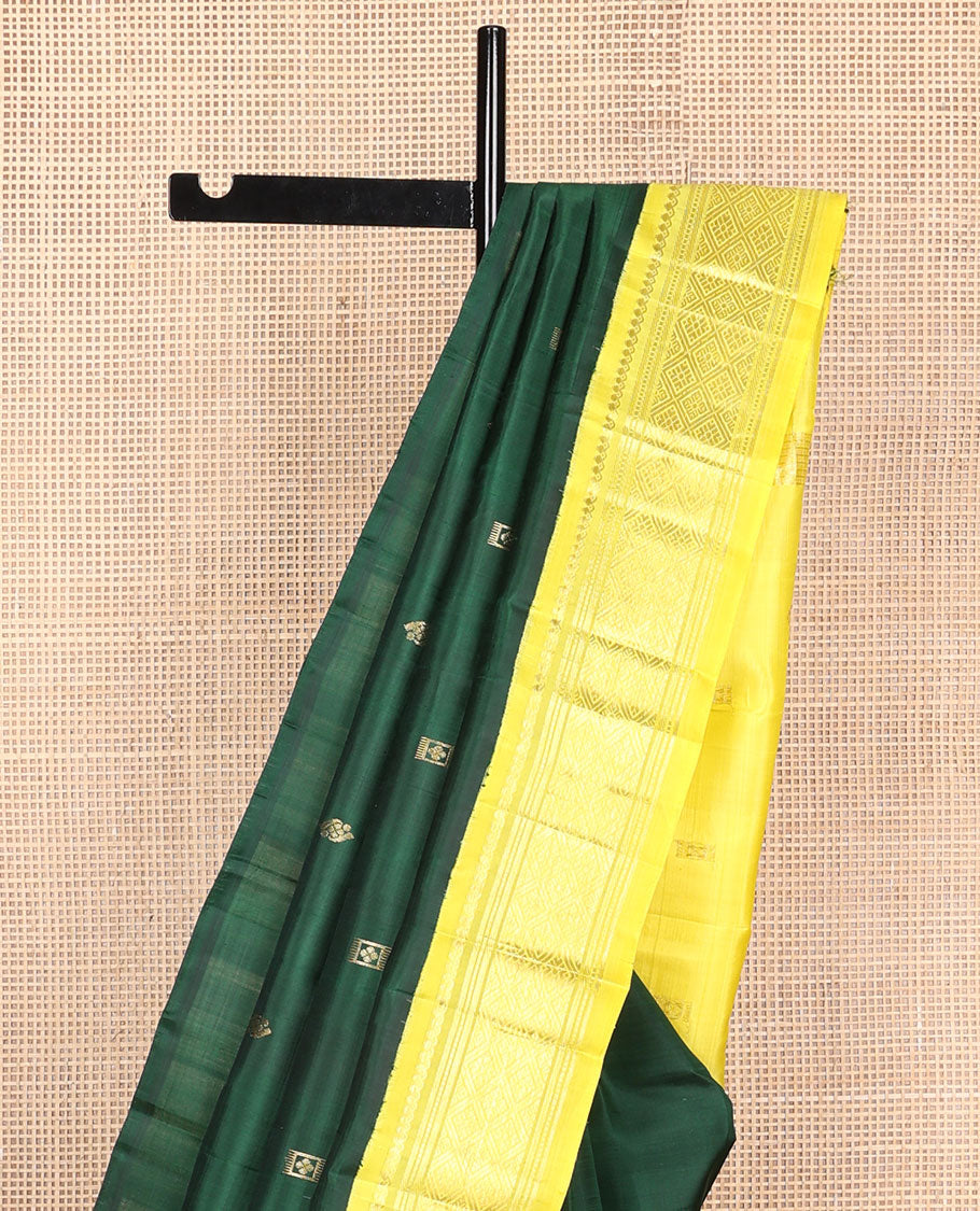 Green zari buttas Kanchipuram silk saree, contrast one-sided korvai border of thilakam mokku, banaras, muthu, and jaal designs, and zari design pallu