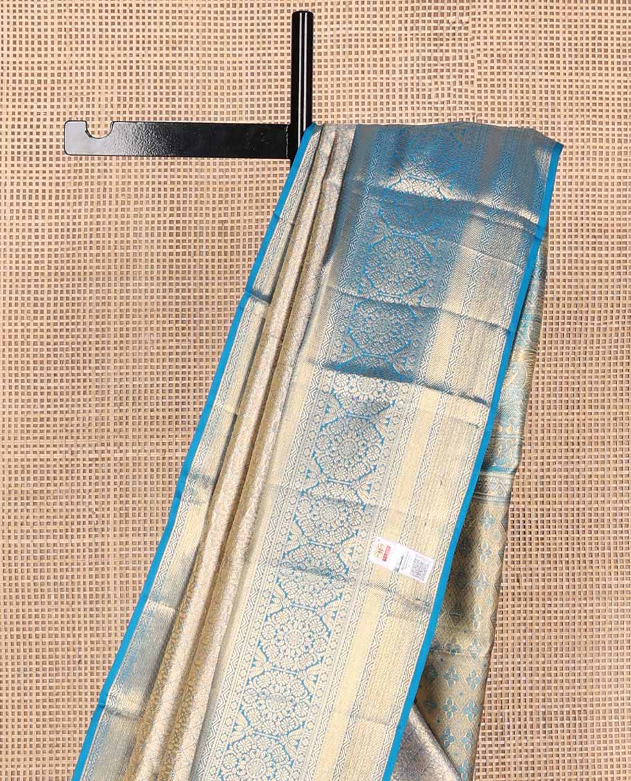 Blue jacquard tissue silk saree, self-pallu of jaal & mayil chakram & zari border of thilakam mokku, neli kathir, jaal & chakram designs
