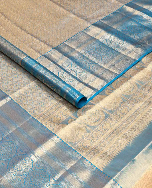 Blue jacquard tissue silk saree, self-pallu of jaal & mayil chakram & zari border of thilakam mokku, neli kathir, jaal & chakram designs