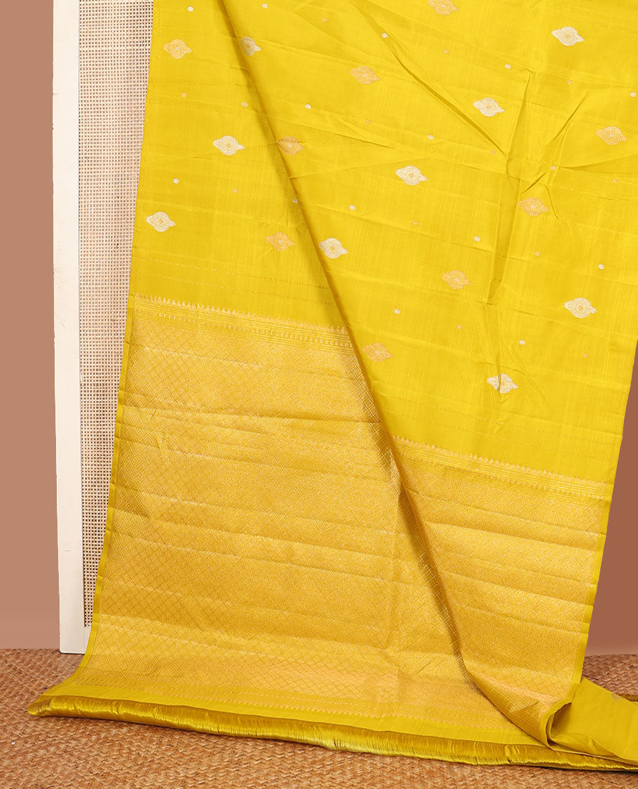 Borderless yellow zari buttas Kanchipuram silk saree, self-pallu of jaal designs