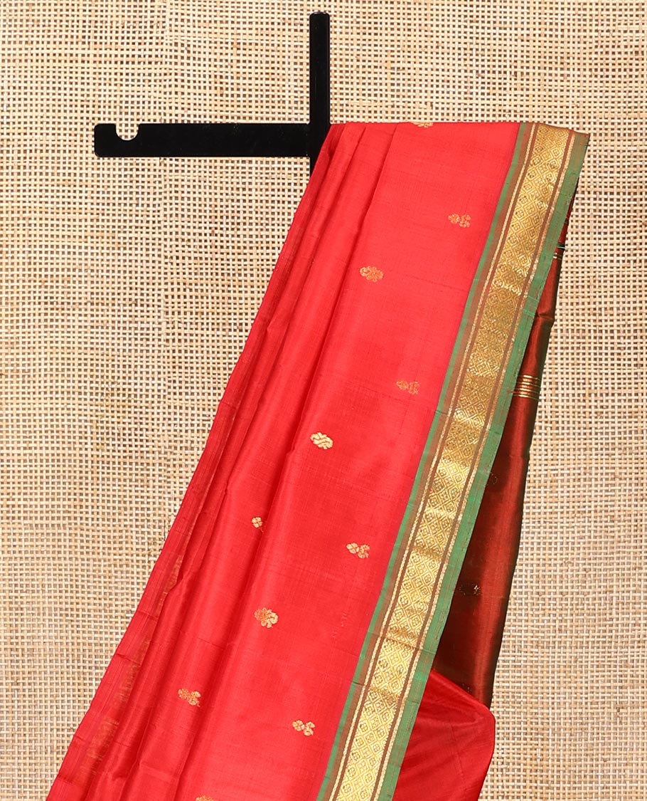 Red Kanchipuram Silk Saree, Embellished with Zari Buttas All Over Its Body, Complemented by a Contrast One-Sided Border of Banaras, and Jaal Designs, Pallu of Zari Designs, and Comes Without a Blouse