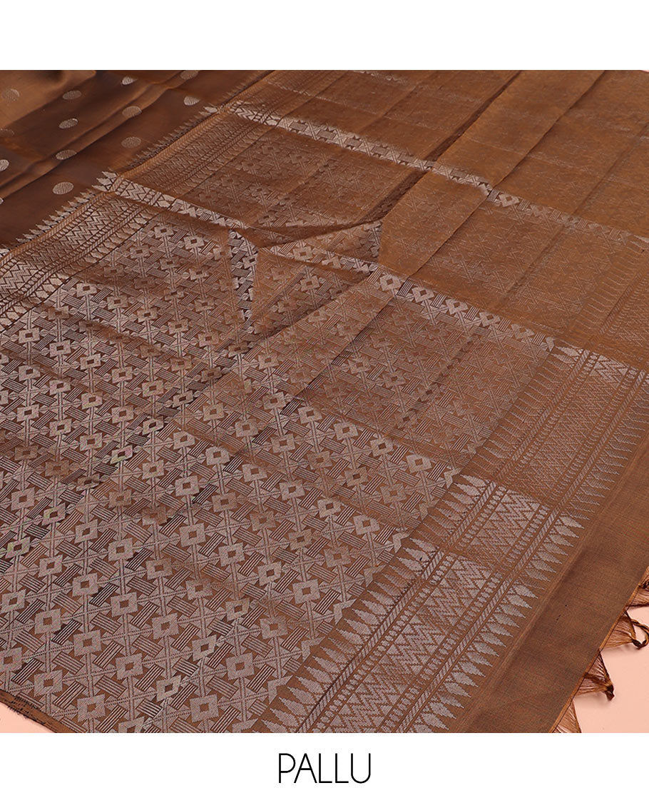 Brown rudraksham buttas soft silk saree, temple geometric patterned border of muniya designs, and intricate pallu
