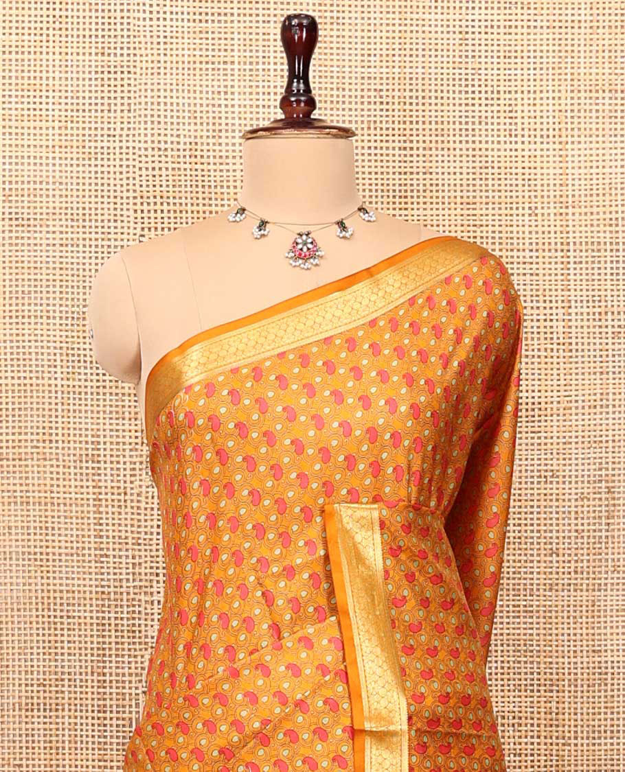 Orange Printed Silk Saree, Steeped with Paisleys, a Traditional Zari Border, Geometric Patterned Pallu, and Matching Blouse
