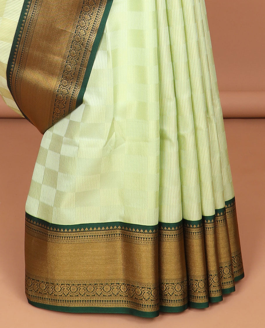 Mint green checked soft silk saree with contrast intricate zari design & argyle design pallu