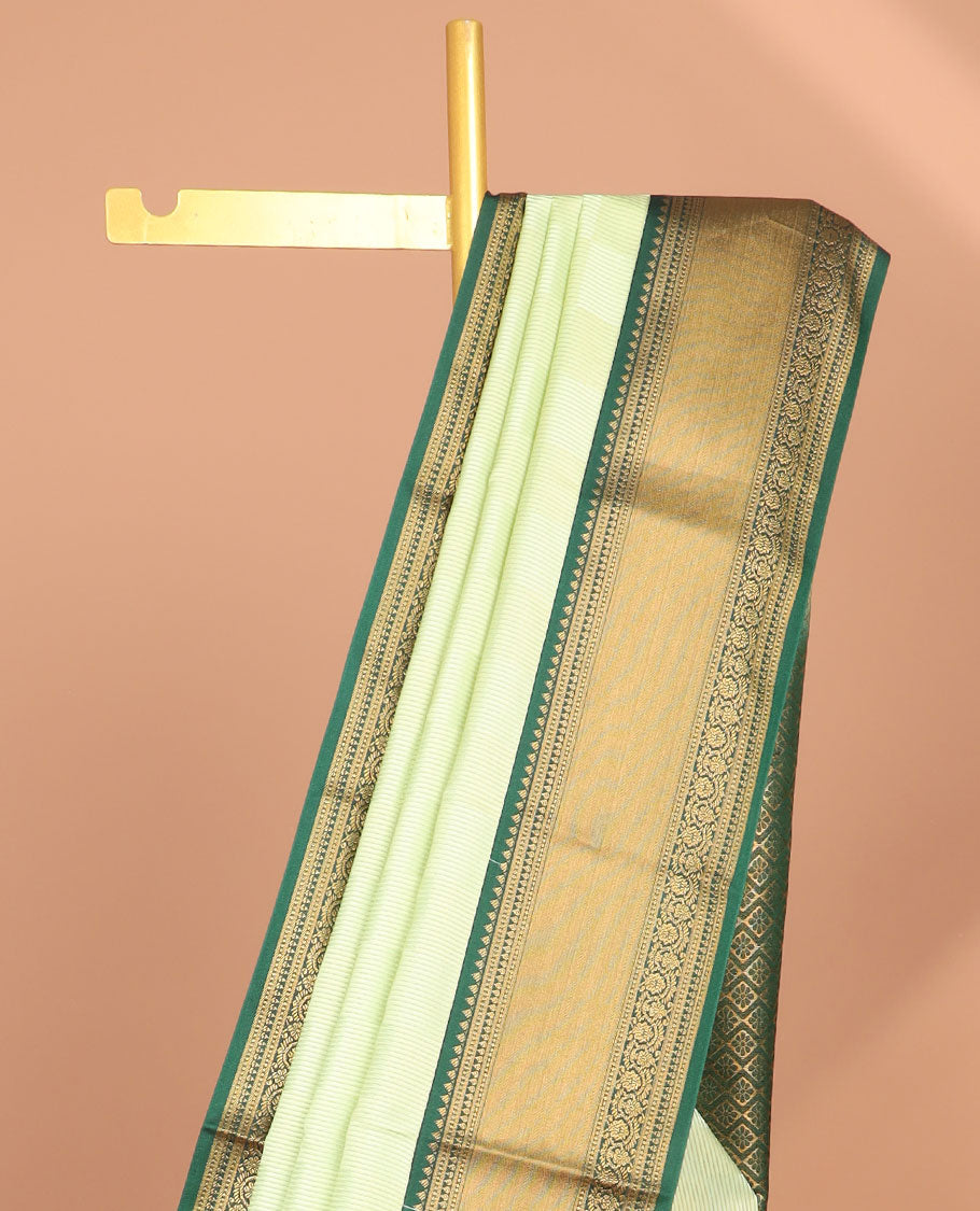 Mint green checked soft silk saree with contrast intricate zari design & argyle design pallu