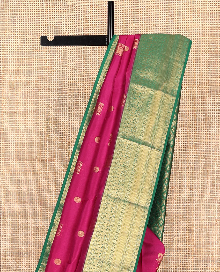 Magenta Vasundhara Lite Silk Mix Saree Enthralled with Mayil, Iruthalai Pakshi, and Chakram Designs, Highlighted with a Contrast Border of Mayil, Kamalam, Mayil Kann, Manga, Rudraksham, and Vanki Designs, Zari Elevated Jaal Pallu, and a Contrast Blouse