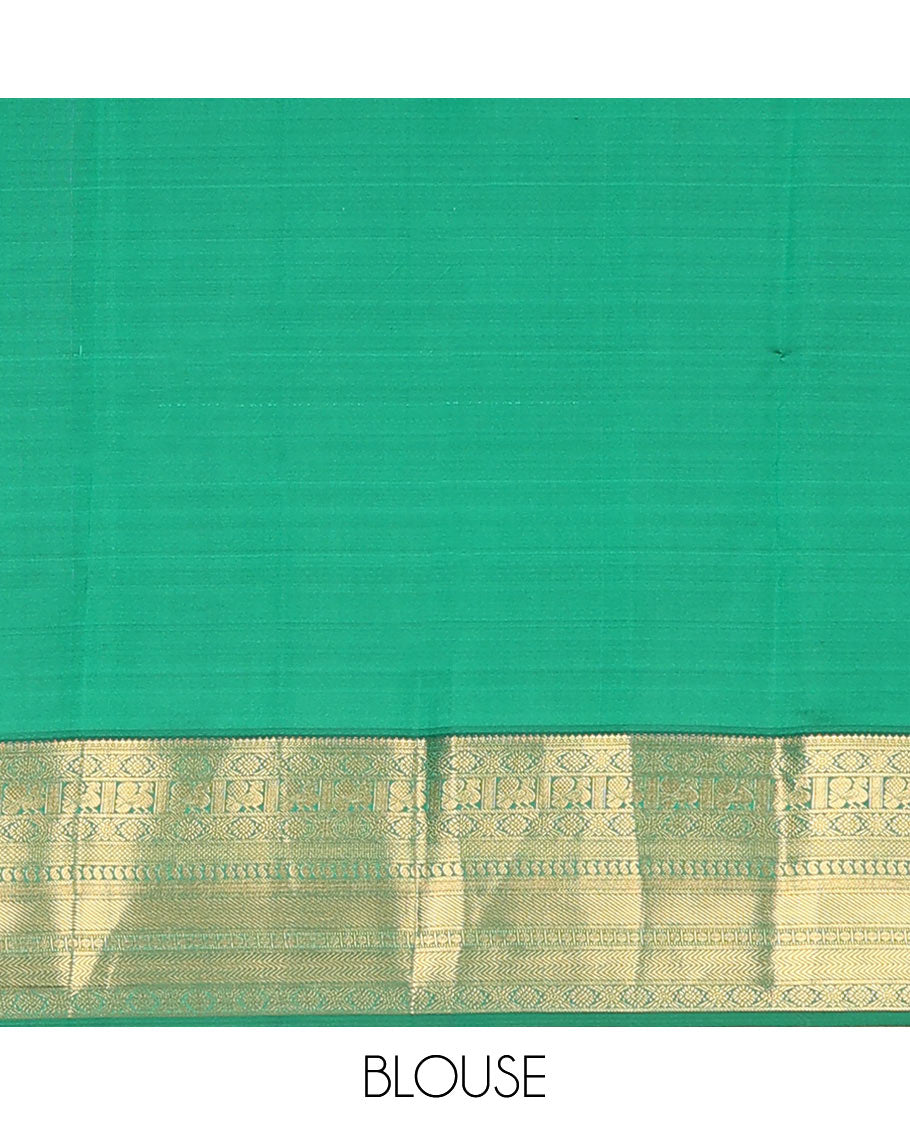 Magenta Vasundhara Lite Silk Mix Saree Enthralled with Mayil, Iruthalai Pakshi, and Chakram Designs, Highlighted with a Contrast Border of Mayil, Kamalam, Mayil Kann, Manga, Rudraksham, and Vanki Designs, Zari Elevated Jaal Pallu, and a Contrast Blouse