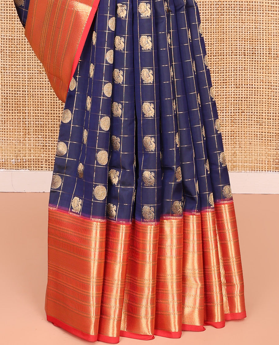 Blue Vasundhara Lite Silk Mix Saree, Grandly Decked Up With Mayil and Chakram Butta Enclosed Checks, Complemented by Contrast Zari Border, Grand Jaal Pallu and Paired with a Contrast Blouse