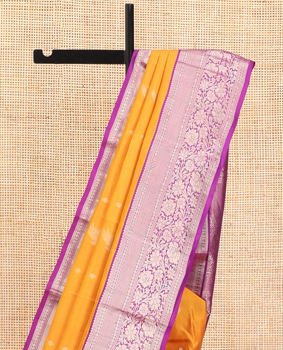 Yellow Vasundhara Silk Saree, Subtly Enriched with Zari Buttas All Over Its Body, Complemented by Contrast Border of Neli, Muthu, Poun, and Kodi Visiry Designs, Grand Pallu, and Paired with a Contrast Blouse