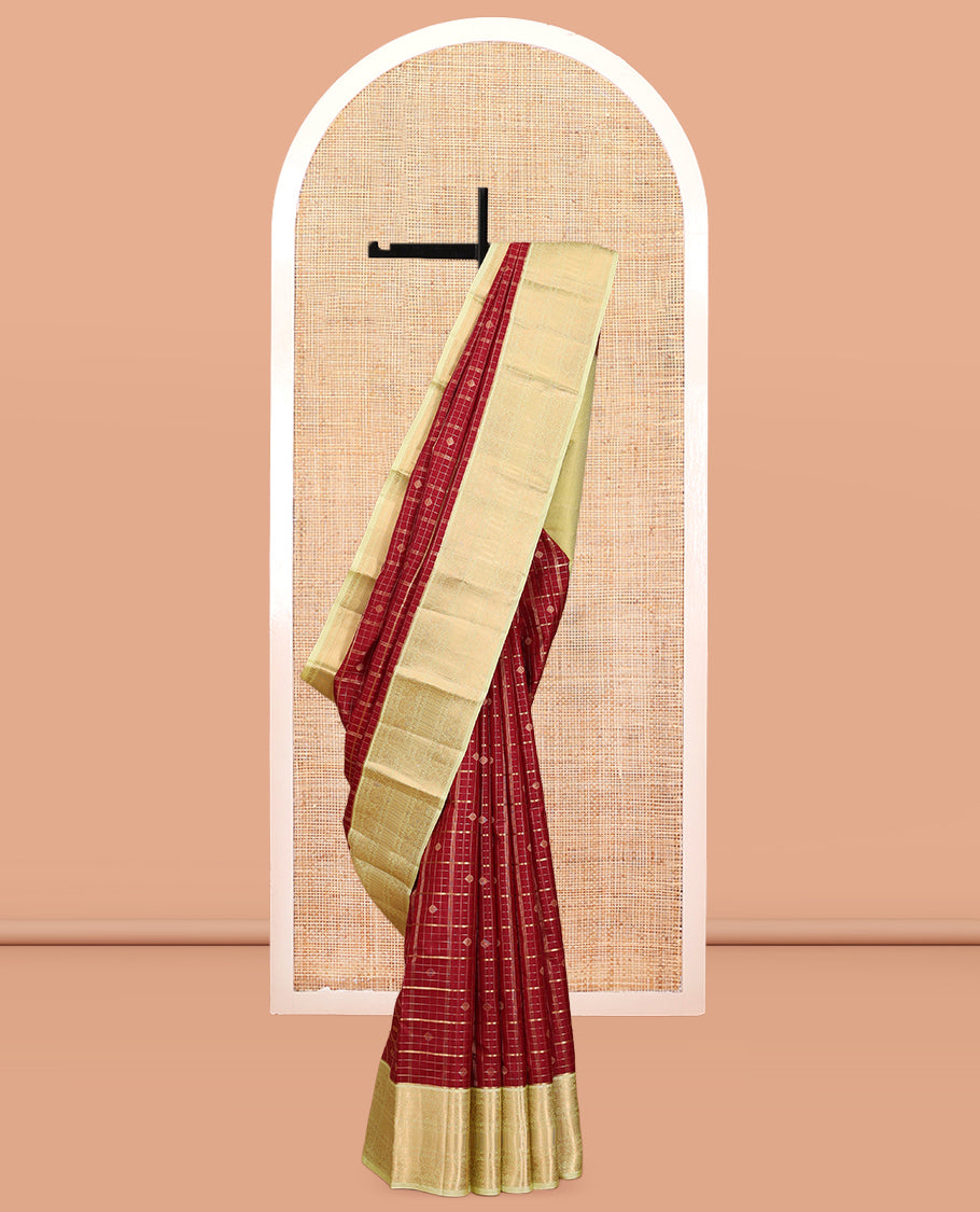 Red Vasundhara Silk Saree, Woven with Zari Buttas and Checks, a Contrast Border of Mayil, and Meen Designs, a Grand Pallu, and a Contrast Blouse