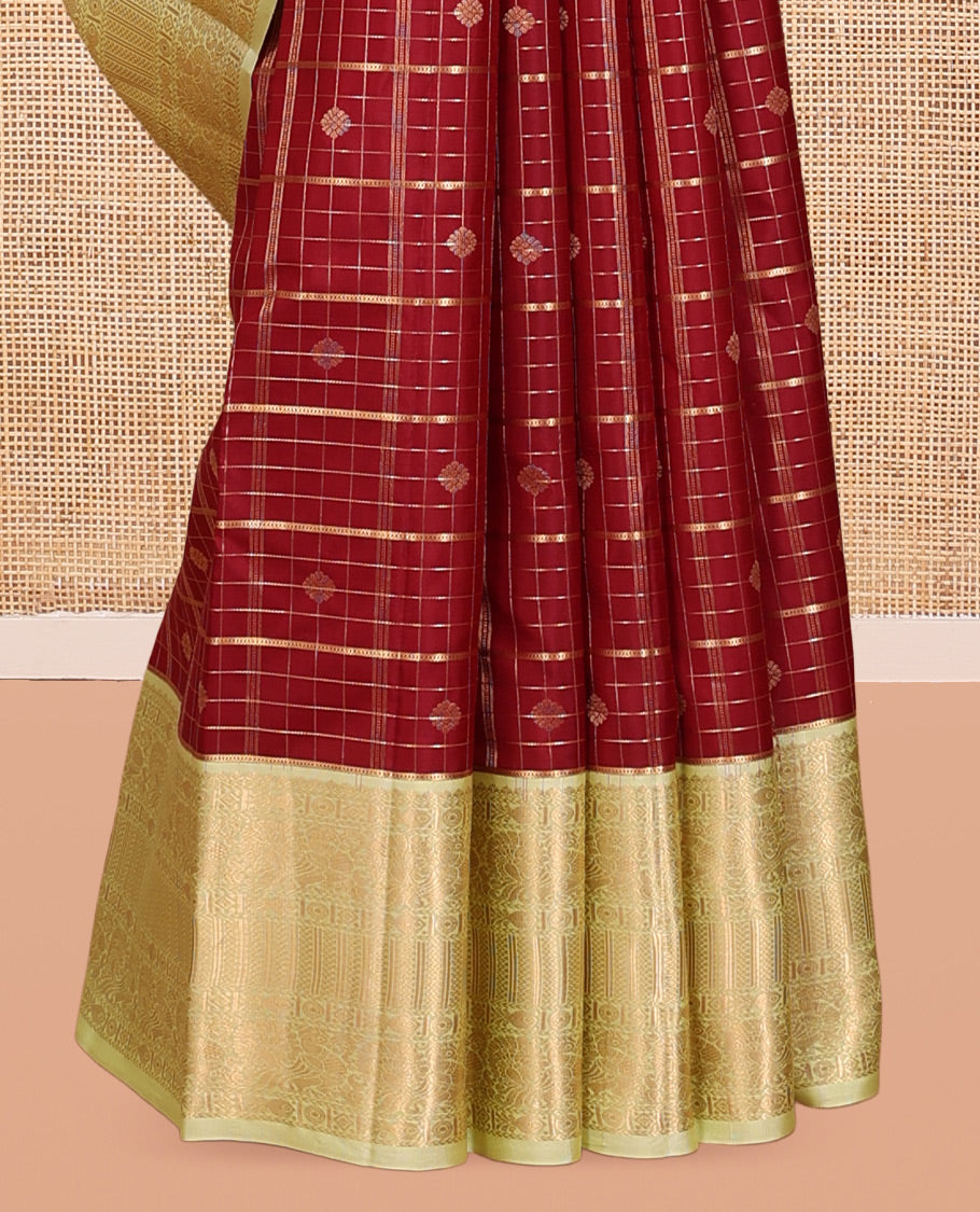 Red Vasundhara Silk Saree, Woven with Zari Buttas and Checks, a Contrast Border of Mayil, and Meen Designs, a Grand Pallu, and a Contrast Blouse