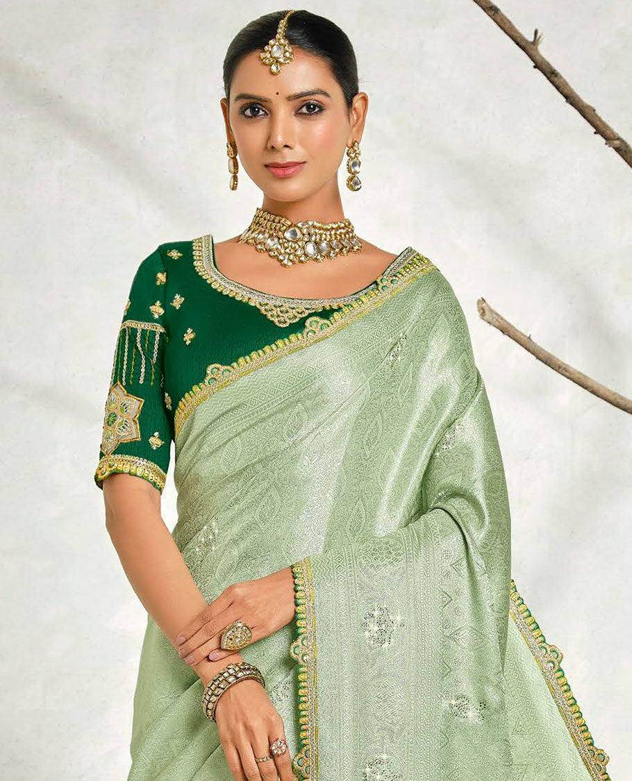 Green ogee embossed & stonework designer saree, traditional design & lace work scallop border & intricate stonework pallu