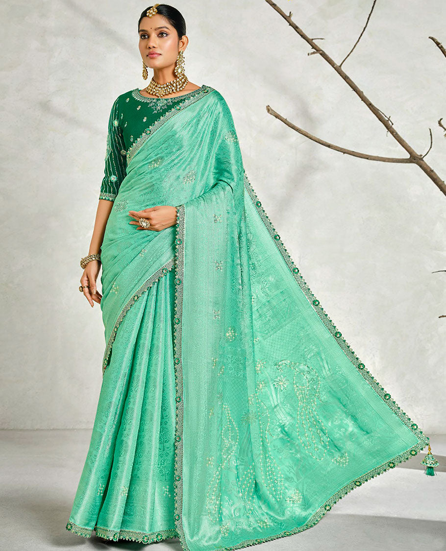 Turquoise floral embossed & stonework designer saree, traditional design & lace work scallop border & intricate stonework pallu