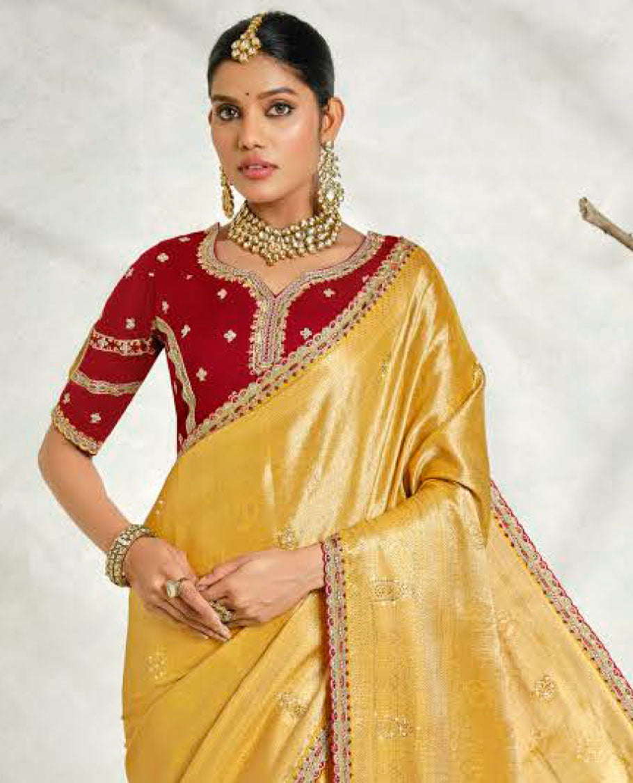 Yellow floral embossed & stonework designer saree, traditional design & lace work scallop border & intricate stonework pallu