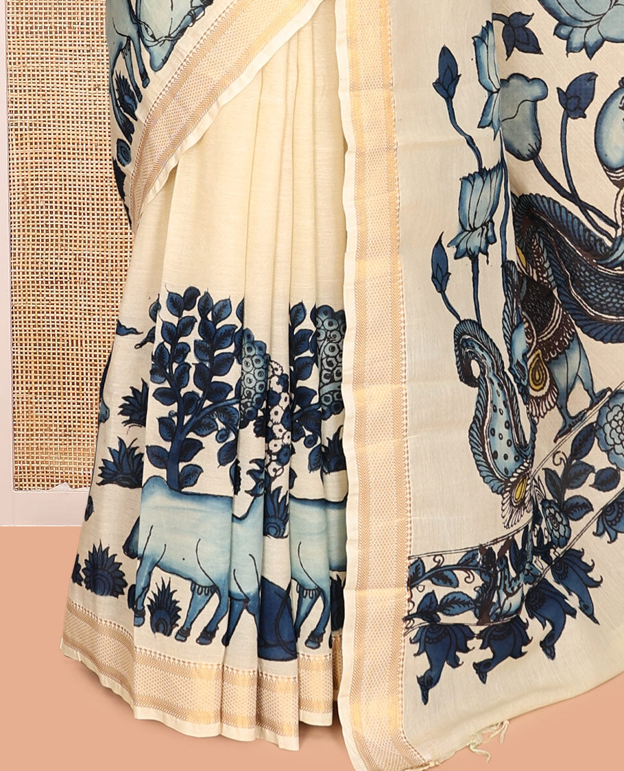 Cream Kalamkari Silk Saree, Crafted with Flora-Fauna Motifs, a Traditional Zari Border, Peacock Kalamkari Pallu, and a Matching Blouse