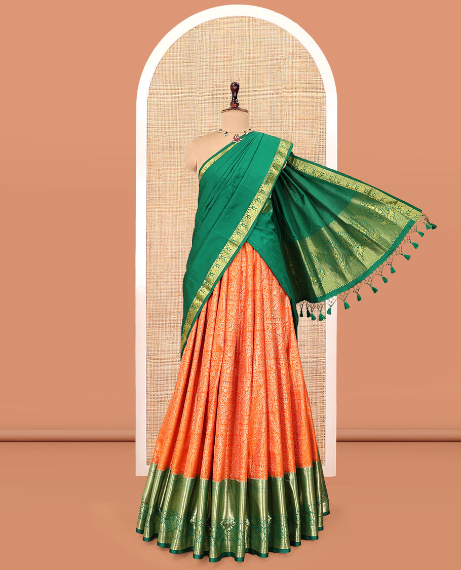 Orange Art Silk Material Half Saree Set, Bedecked with Jacquard Skirt, a Contrast Traditional Zari Border, Contrast Blouse, and an Intricate Dhavani