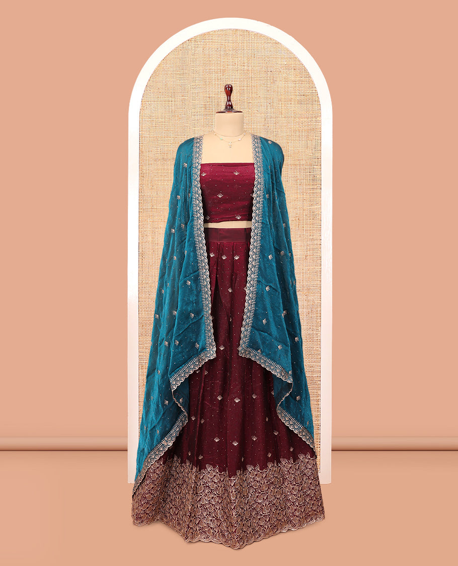 Wine Banarasi Half-Saree, Opulently Embellished with Embroidered Skirt, a Floral Embroidered Border, a Matching Blouse, and Contrast Scallop Embroidered Dupatta