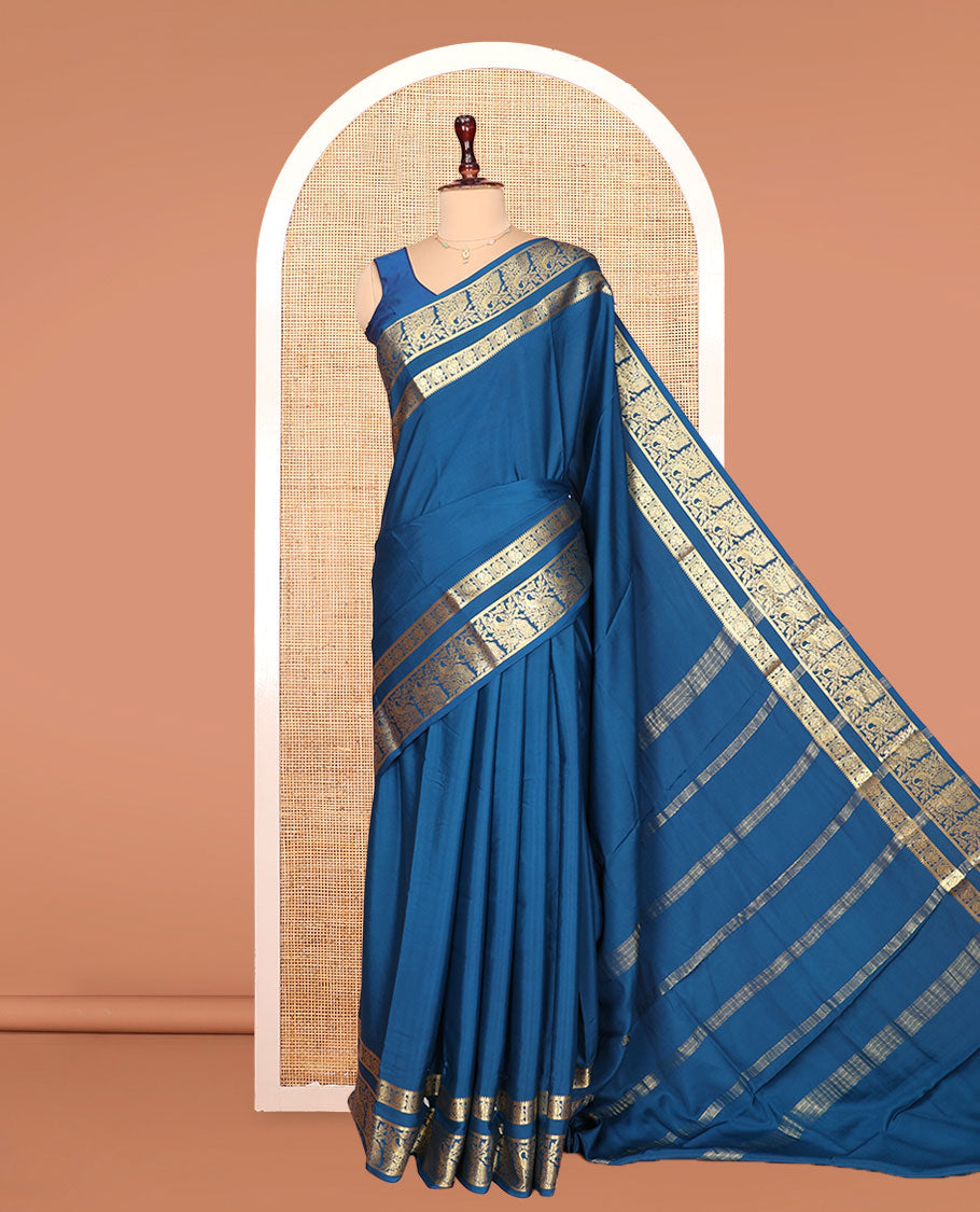 Peacock Blue Plain Mysore Silk Saree, Richly Detailed with Zari Border of Peacock Designs, Sparsely Woven Pallu of Stripes, and Paired with a Matching Blouse