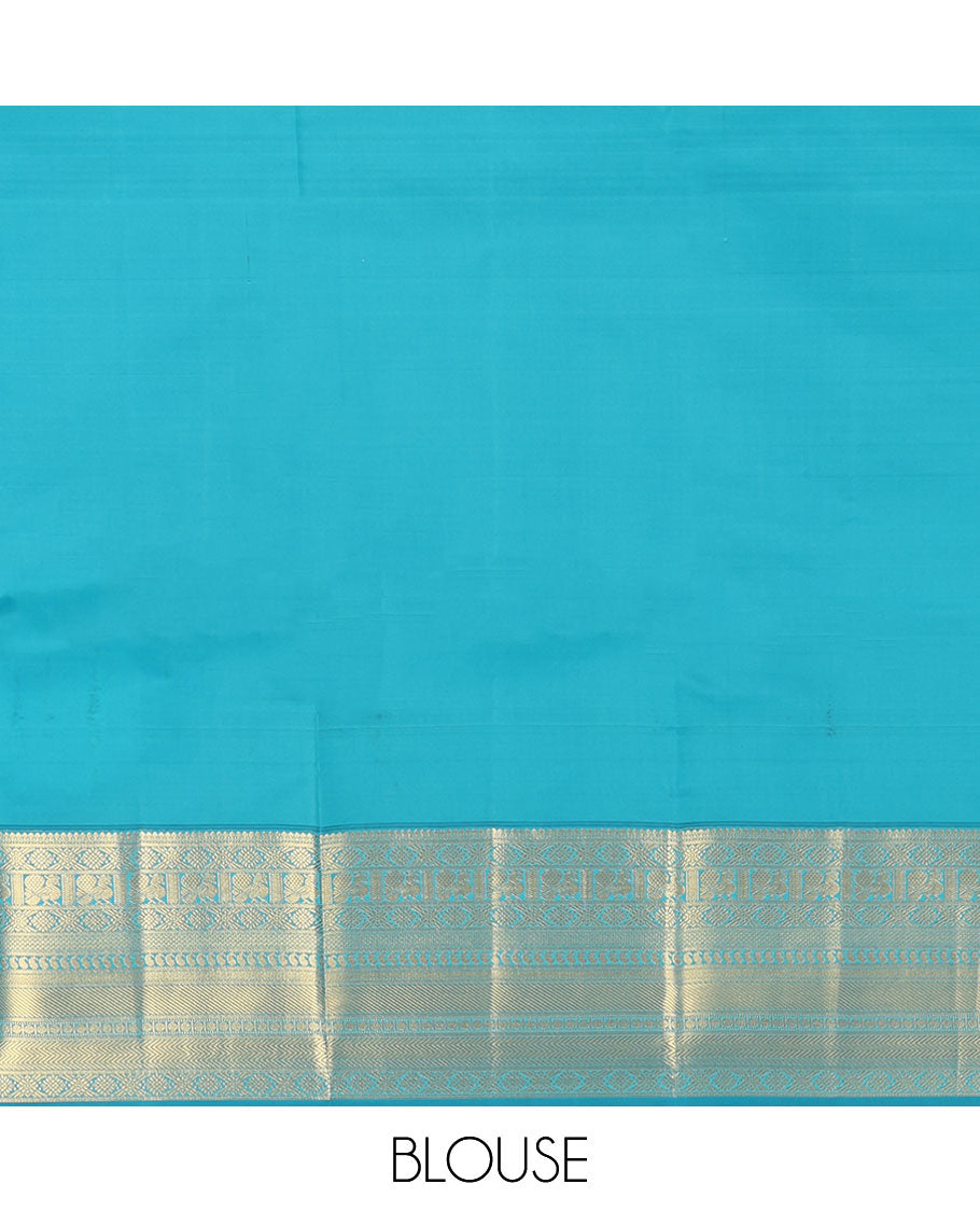 Orange Vasundhara Lite Silk Mix Saree, Detailed with Mayil, Chakra, and Iruthalai Pakshi Buttas, Complemented by Contrast Border of Thilakam Mokku, Mayil, Manga, Vanki, and Mayil Kann Designs, Opulently Embellished Jaal Pallu, and a Contrast Blouse