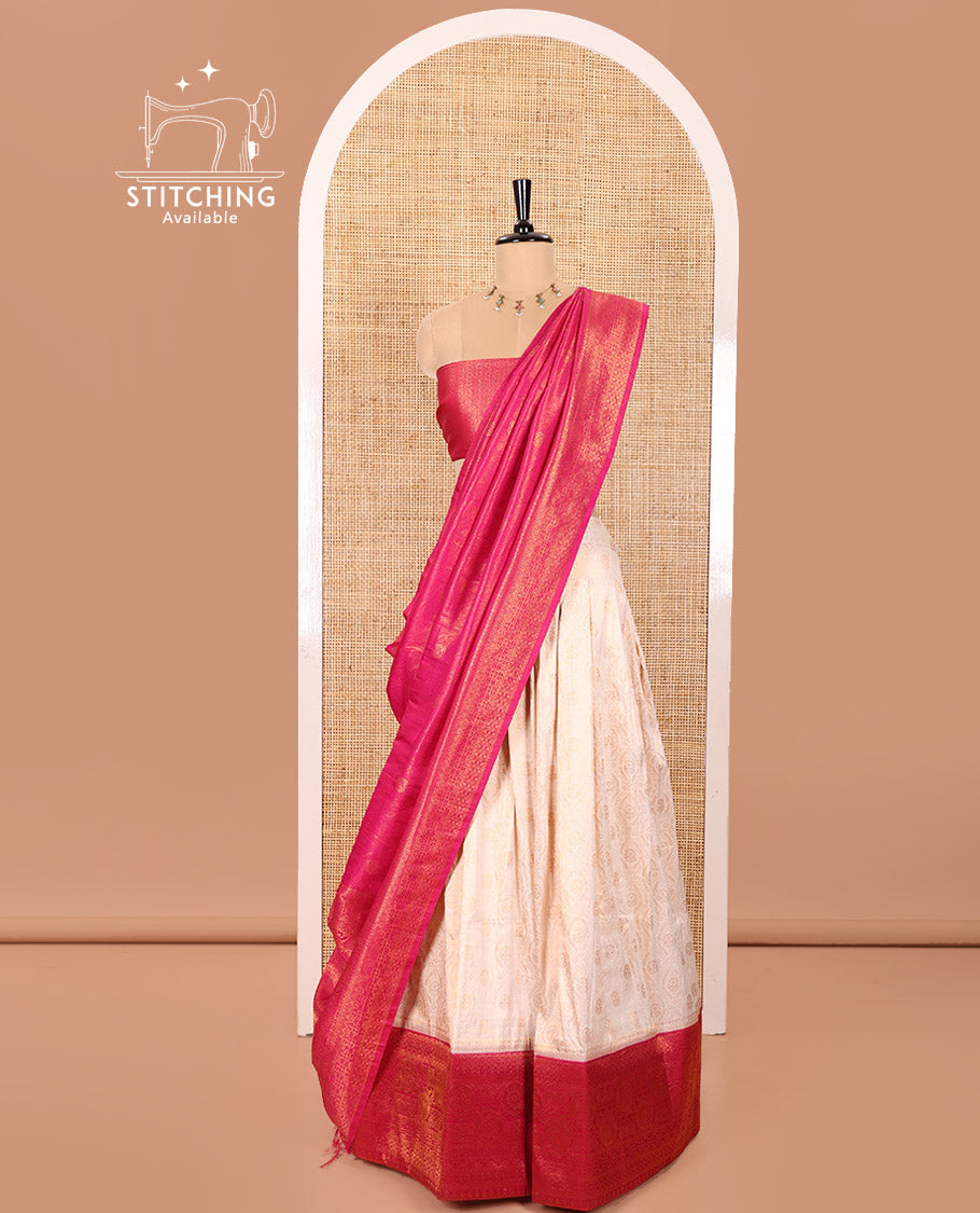 Cream and Magenta Banaras Softy Half-Saree Featuring Jacquard Design All Over the Skirt, Elevated with a Contrast Geometric Zari Design Border, Paired with a Jacquard Blouse, and a Banaras Softy Dhavani with Floral Jaal Jacquard Design