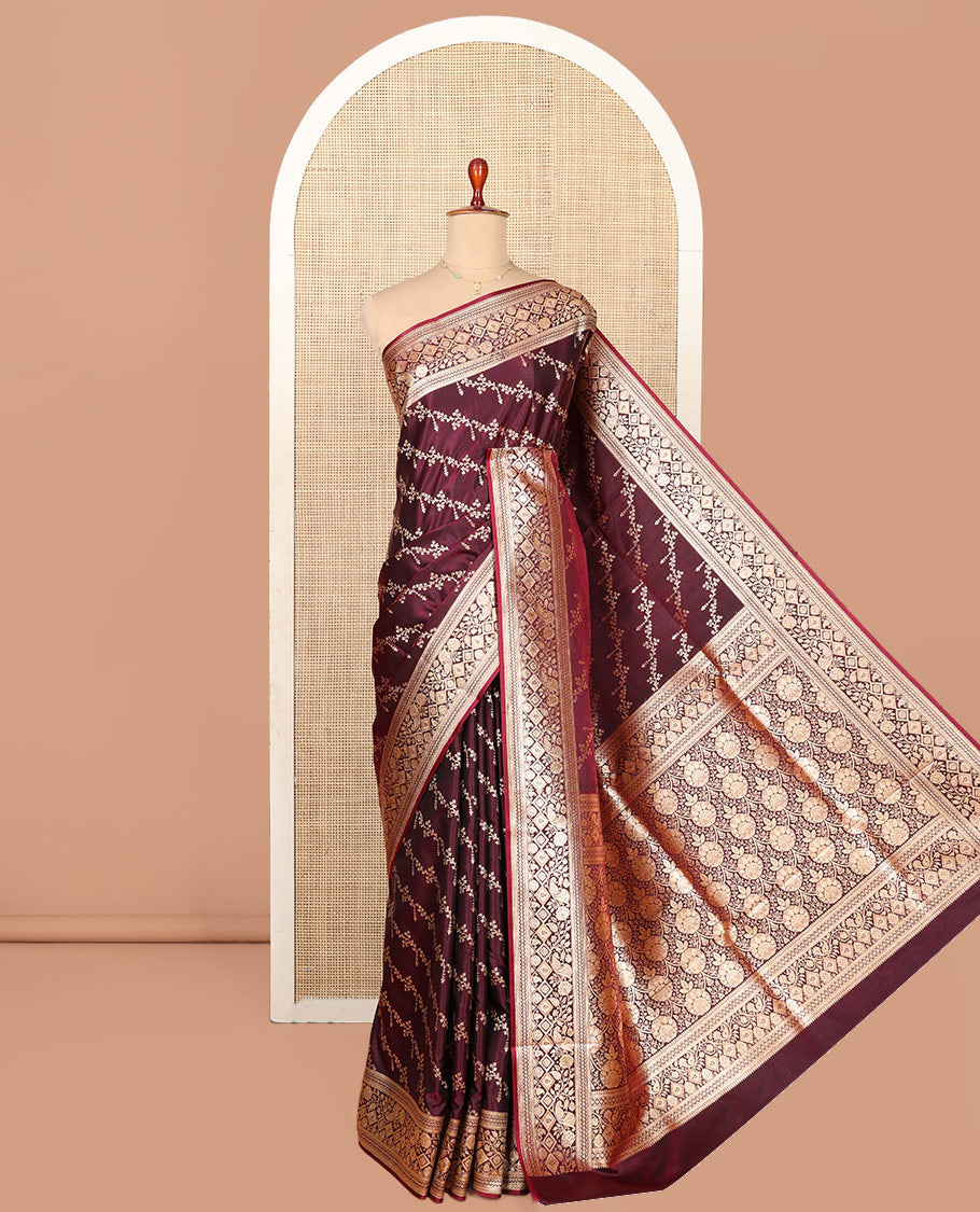 Wine Semi-Banaras Saree, Artfully Detailed with Floral Jaal Jacquard All Over Its Body, Highlighted by a Traditional Motif Border, Intricately Designed Pallu, and Paired with a Matching Blouse