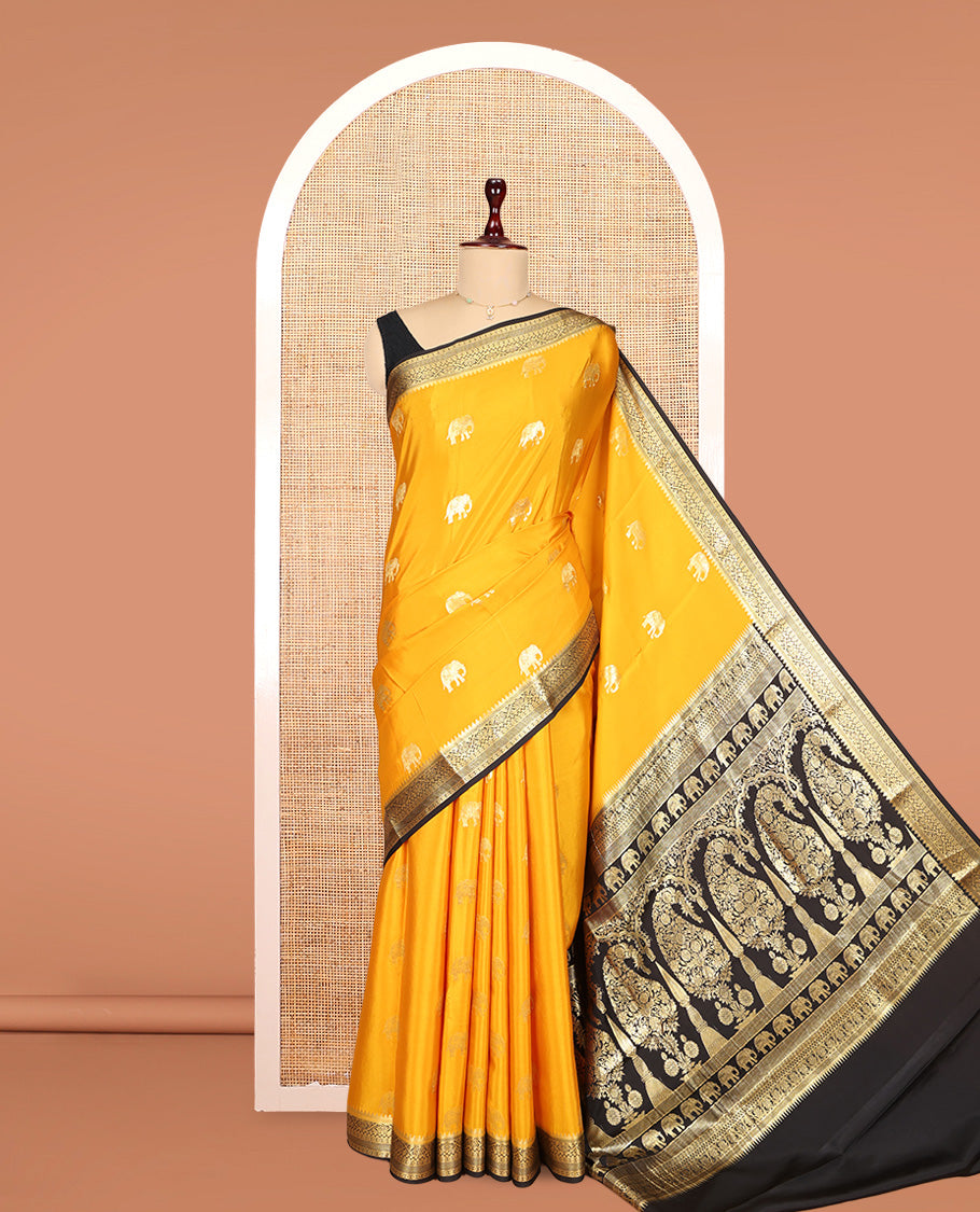 Yellow Mysore Silk Saree, Adorned with Elephant Buttas, Complemented by a Contrast Traditional Zari Border, Grand Pallu, and a Contrast Blouse