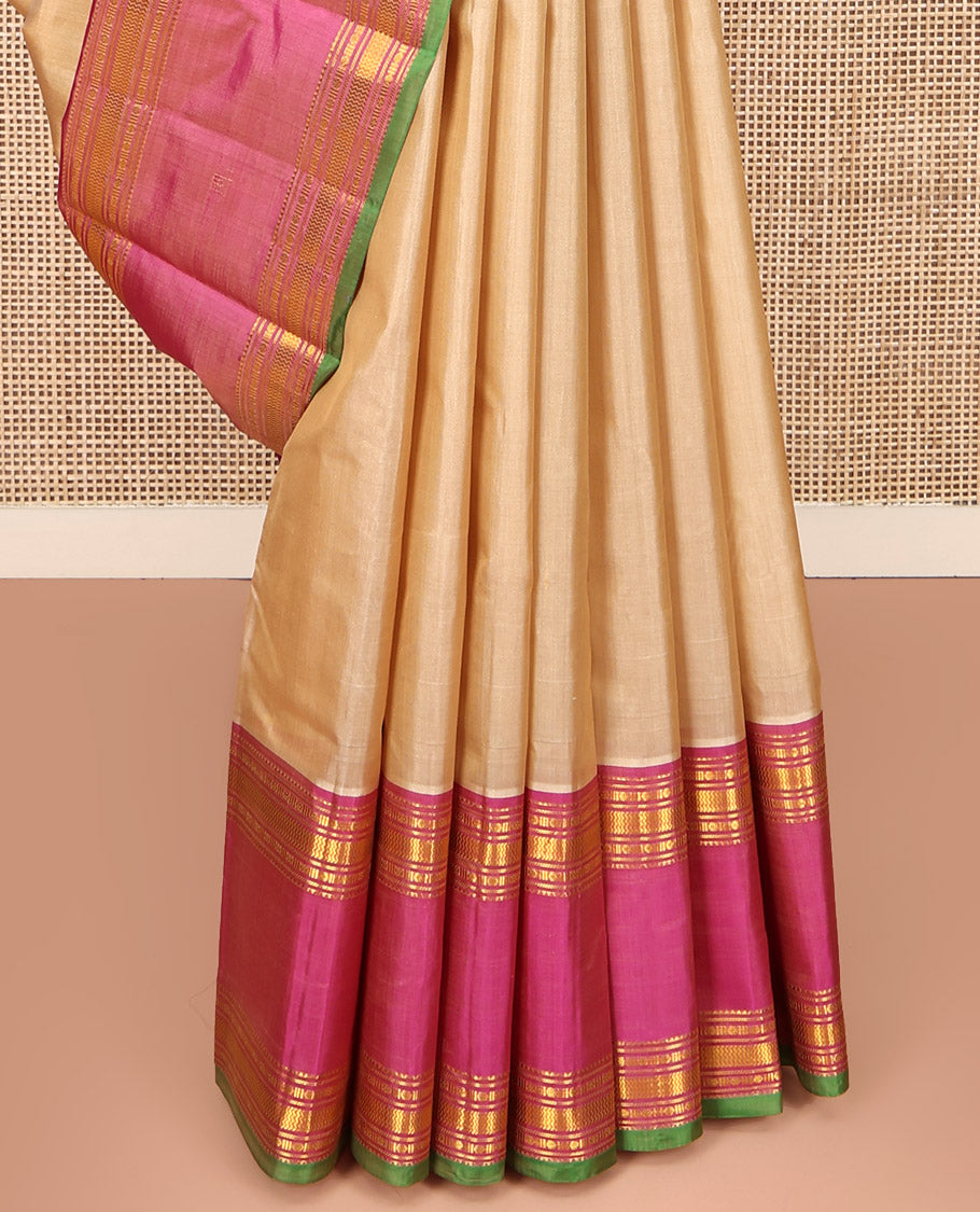 Sandal Plain Kanchipuram Silk Saree, Complemented by Contrast Rettai Pettu Border of Rekku, Rudraksham, and Vanki Designs, Pallu of Traditional Zari Designs, and Paired with a Contrast Blouse