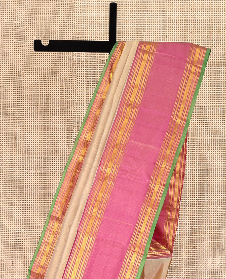 Sandal Plain Kanchipuram Silk Saree, Complemented by Contrast Rettai Pettu Border of Rekku, Rudraksham, and Vanki Designs, Pallu of Traditional Zari Designs, and Paired with a Contrast Blouse