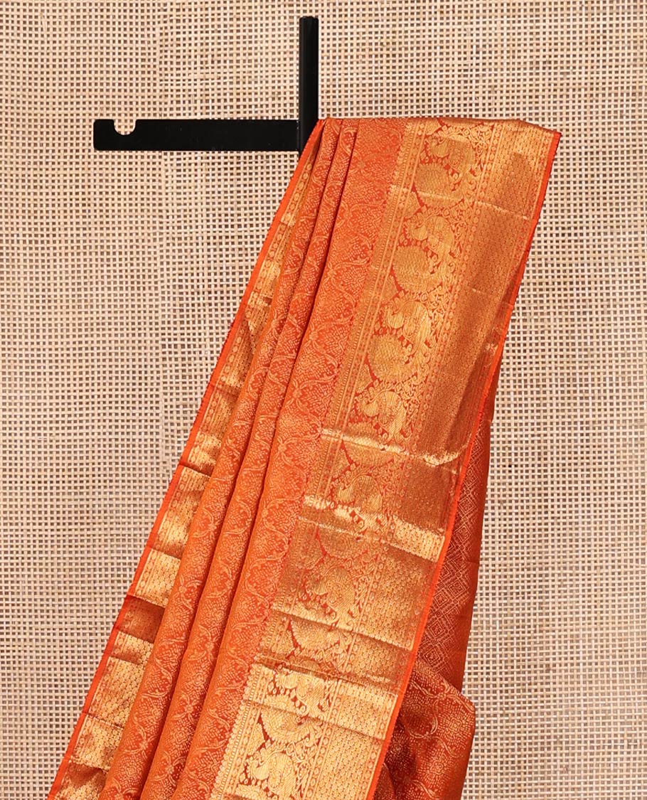 Rust Kanchipuram Wedding Silk Saree, Sparsely Woven with Jacquard Design On Its Body, Highlighted by Zari Border of Manga Mokku and Mayil Designs, Grand Jaal Pallu and Paired with a Matching Blouse