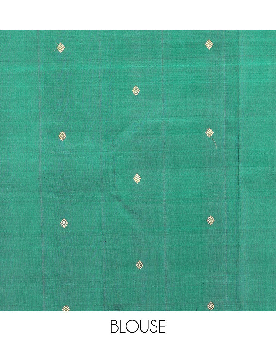 Borderless blue and green striped and buttas Kanchipuram silk saree, self-pallu features zari buttas
