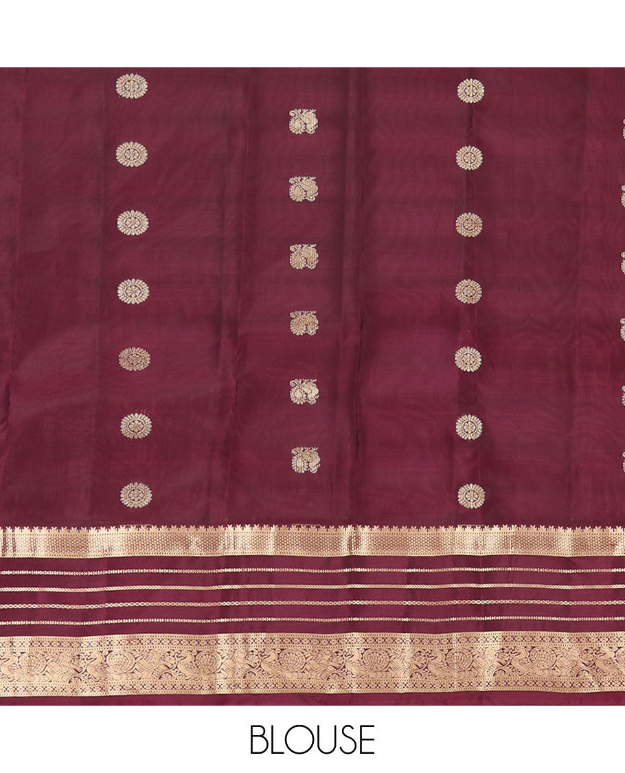 Red Vasundhara Lite Silk Mix Saree, Prettified with Mayil-Chakram Buttas, a Contrast Border of Rekku, Muthu, and Mayil Designs, Grand Pallu, and a Contrast Blouse