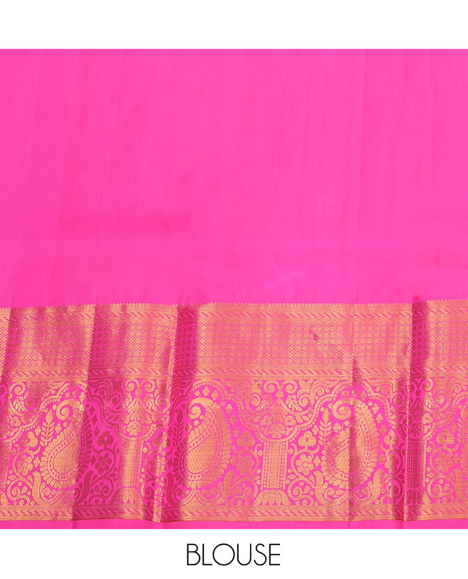 Green Pure Silk Half-Saree, Adorned with Mayil-Chakram Buttas All Over Its Skirt, Complemented by Contrast Border of Puli Nagam, Jaal, and Arumbu Manga Designs, Paired with a Contrast Blouse, and Comes with a Zari Design Woven Dhavani