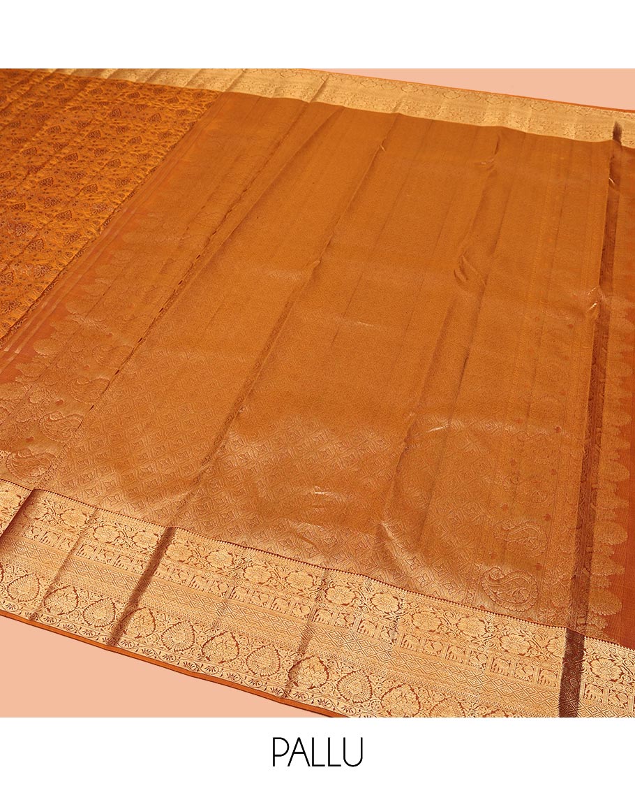 Orange Kanchipuram Wedding Silk Saree, Finely Crafted with Jacquard Designs on Its Body, Highlighted by a Zari Border of Thilakam, Kodi Visiry, Mayil, Yaanai, Jaal, and Lavangam Designs, Grand Ogee Patterned Pallu, and Paired with a Matching Blouse
